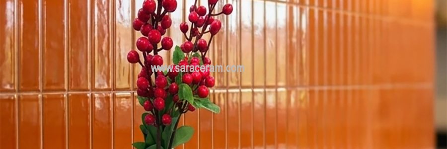 سرامیک بین کابینتی نارنجی TA1320S1R5-20 در ترکیب با کابینت مشکی